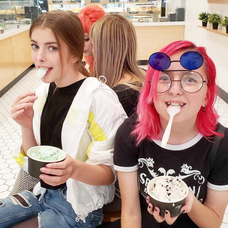 two kids enjoying their ice cream
