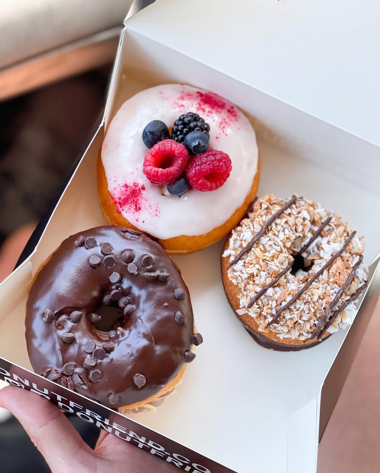 a box of three donuts